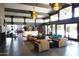 Grand lobby featuring stylish furniture, modern lighting, and an open layout with community amenities at 40215 N 110Th Pl, Scottsdale, AZ 85262