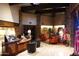 Grand lobby featuring stone accents, a reception desk, seating area, and American flag at 40215 N 110Th Pl, Scottsdale, AZ 85262