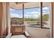 Serene primary suite view showcases lush greenery and an outdoor spa at 40215 N 110Th Pl, Scottsdale, AZ 85262