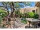 Charming patio area with desert landscaping, providing a tranquil outdoor retreat at 40215 N 110Th Pl, Scottsdale, AZ 85262