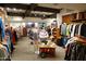 Stylish clothing and accessories in a well-organized retail shop offering an upscale shopping experience at 40215 N 110Th Pl, Scottsdale, AZ 85262