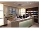 Bright spa reception area with a friendly staff offers a premium experience with a wide range of products on display at 40215 N 110Th Pl, Scottsdale, AZ 85262
