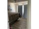 Cozy bedroom with gray curtains and a comfortable bed at 4123 N 106Th N Ave, Phoenix, AZ 85037