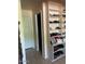 Organized closet space with built-in shelves and ample storage for shoes and accessories at 4123 N 106Th N Ave, Phoenix, AZ 85037