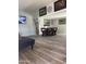 Spacious living room area perfect for relaxing and entertaining, featuring tiled floors and natural light at 4123 N 106Th N Ave, Phoenix, AZ 85037