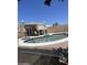 Resort-style pool surrounded by patio, perfect for outdoor entertaining with shade and easy access to house at 4123 N 106Th N Ave, Phoenix, AZ 85037
