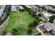 Overhead view featuring a sports field with soccer goals and a walking path around the perimeter at 4149 E Devon Dr, Gilbert, AZ 85296