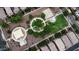 This aerial view showcases a park with a playground, walking paths, and shade structures at 4149 E Devon Dr, Gilbert, AZ 85296