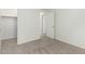 Empty bedroom with carpet and open doorway at 4149 E Devon Dr, Gilbert, AZ 85296