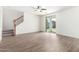 Bright and airy living space with staircase and sliding door access to outdoor living at 4149 E Devon Dr, Gilbert, AZ 85296