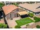 Backyard aerial view highlighting the patio, lawn area, and private fencing at 42505 W Venture Rd, Maricopa, AZ 85138