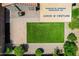Private backyard space in Rancho El Dorado, featuring manicured turf and brick-paved patio area at 42505 W Venture Rd, Maricopa, AZ 85138