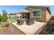 Backyard: Outdoor seating, artificial turf, gazebo-covered hot tub, and easy outdoor living at 5612 N 109Th Ave, Phoenix, AZ 85037