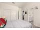 Cozy bedroom with closet and access to the ensuite bathroom at 5612 N 109Th Ave, Phoenix, AZ 85037