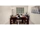 Formal dining room featuring a wooden table with seating for eight and elegant decor at 5612 N 109Th Ave, Phoenix, AZ 85037