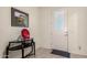 Welcoming foyer with a decorative table and artwork near the front door at 5612 N 109Th Ave, Phoenix, AZ 85037