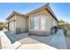 Single-story home with desert landscaping and covered entry at 6319 W Hilton Ave, Phoenix, AZ 85043