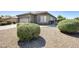 Single-story home with desert landscaping and covered entry at 6319 W Hilton Ave, Phoenix, AZ 85043