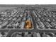 An aerial view of a neighborhood, with one house highlighted in color at 7145 E Eagle Nest Way, San Tan Valley, AZ 85143
