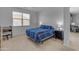 Inviting bedroom featuring a king-size bed with a blue patterned comforter at 7145 E Eagle Nest Way, San Tan Valley, AZ 85143