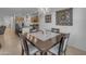 Elegant dining area featuring modern light fixtures, stylish decor, and comfortable seating for Gathering gatherings at 7145 E Eagle Nest Way, San Tan Valley, AZ 85143