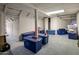 Unfinished basement is spacious with blue storage tubs, offering ample storage and organization at 7252 N Central Ave, Phoenix, AZ 85020