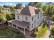Aerial view showcases a lovely home with a covered porch and a well-maintained lawn at 7252 N Central Ave, Phoenix, AZ 85020