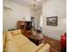 Inviting living room featuring a comfortable sofa, hardwood floors, and traditional décor accents at 7252 N Central Ave, Phoenix, AZ 85020