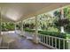 Inviting porch with chairs, columns, and green landscaping provides a relaxing outdoor space at 7252 N Central Ave, Phoenix, AZ 85020