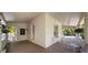 Inviting porch with white columns, chairs, and seasonal floral decor at 7252 N Central Ave, Phoenix, AZ 85020
