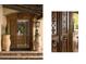 Ornate wooden front door with decorative carvings and potted plants at 7525 N Shadow Mountain Rd, Paradise Valley, AZ 85253