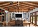 Spacious office featuring an expansive wood ceiling, large TV, and wooden furniture at 7525 N Shadow Mountain Rd, Paradise Valley, AZ 85253