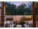 Relaxing outdoor patio area with seating, fountain, and lush landscaping at 7525 N Shadow Mountain Rd, Paradise Valley, AZ 85253