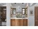 Elegant bathroom vanity with custom cabinetry and stylish mirrors at 7525 N Shadow Mountain Rd, Paradise Valley, AZ 85253