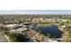 Beautiful aerial view of community amenities with pool, lake, and golf course in a desirable neighborhood at 7834 E Mariposa Way, Mesa, AZ 85208