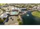 Beautiful aerial view of community amenities with pool, lake, and lush landscaping in a desirable neighborhood at 7834 E Mariposa E Way, Mesa, AZ 85208