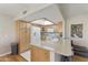 Bright kitchen with stainless appliances, granite counters, and ample cabinet space at 7834 E Mariposa Way, Mesa, AZ 85208