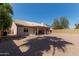 This backyard features a large patio area and low-maintenance landscaping at 821 E Chicago St, Chandler, AZ 85225