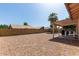 Fully-fenced backyard features a patio and low-maintenance desert landscaping at 821 E Chicago St, Chandler, AZ 85225