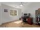 Bedroom with wood-look flooring that can be used as home office with natural light from window at 821 E Chicago St, Chandler, AZ 85225