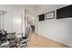 This home office features wood-look floors and access to dining room at 821 E Chicago St, Chandler, AZ 85225