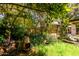 Secluded backyard retreat with mature landscaping and cozy seating area perfect for relaxation at 930 E Page St, Gilbert, AZ 85234