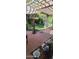 Tranquil backyard retreat with a charming pergola-covered patio and lush green landscaping at 930 E Page St, Gilbert, AZ 85234