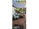 Relaxing backyard patio with comfortable seating, shaded by a pergola, ideal for outdoor living at 930 E Page St, Gilbert, AZ 85234