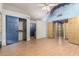 Large bedroom with multiple closets and doorways, offering ample space and versatility at 930 E Page St, Gilbert, AZ 85234