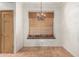 Charming breakfast nook features a window seat, chandelier, and nearby kitchen access at 930 E Page St, Gilbert, AZ 85234