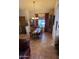 The dining room has beautiful tile flooring and a large window that allows for plenty of natural light at 930 E Page St, Gilbert, AZ 85234