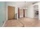 Dining area with tile flooring, a chandelier, and direct access to the kitchen, perfect for Gathering meals at 930 E Page St, Gilbert, AZ 85234