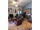 Spacious living room with a fireplace, vaulted ceilings, and ample seating at 930 E Page St, Gilbert, AZ 85234
