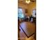 Home office featuring ample natural light, desk space, and neutral flooring at 930 E Page St, Gilbert, AZ 85234